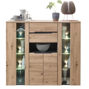 Highboard MEMPHIS Artisan Eiche Graphit mit beleuchteten Seitenvitrinnen und zentralem Schubkasten in Gesamtansicht.