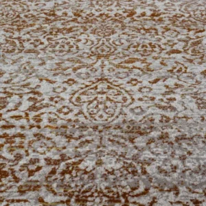 Teppich Magic 200x290 cm Sunrise-Orange, Detailaufnahme des gemusterten Flors mit Ornamentmotiv.